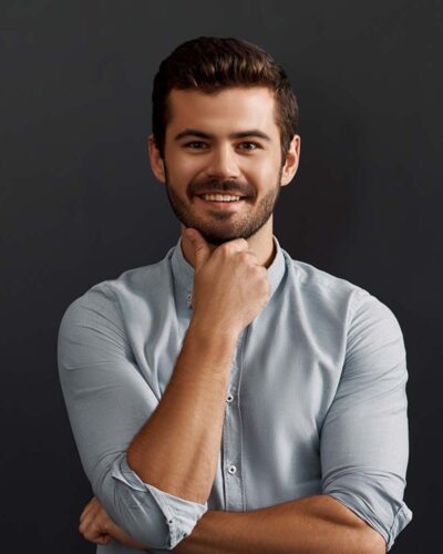 happy-to-work-here-cheerful-young-bearded-man-loo-CT2WE4F.jpg